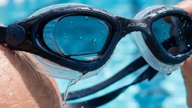 High-end swimming goggles leaking water from the silicone gasket seal